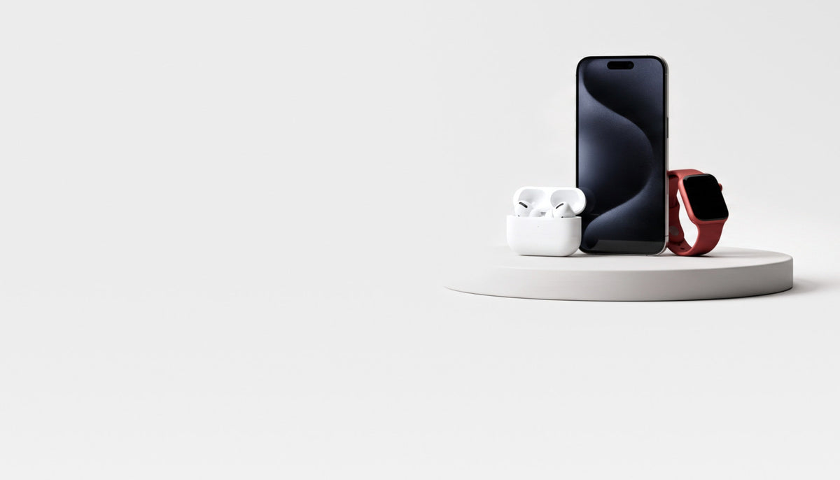 Smartphone, earbuds and smartwatch on a light grey podium